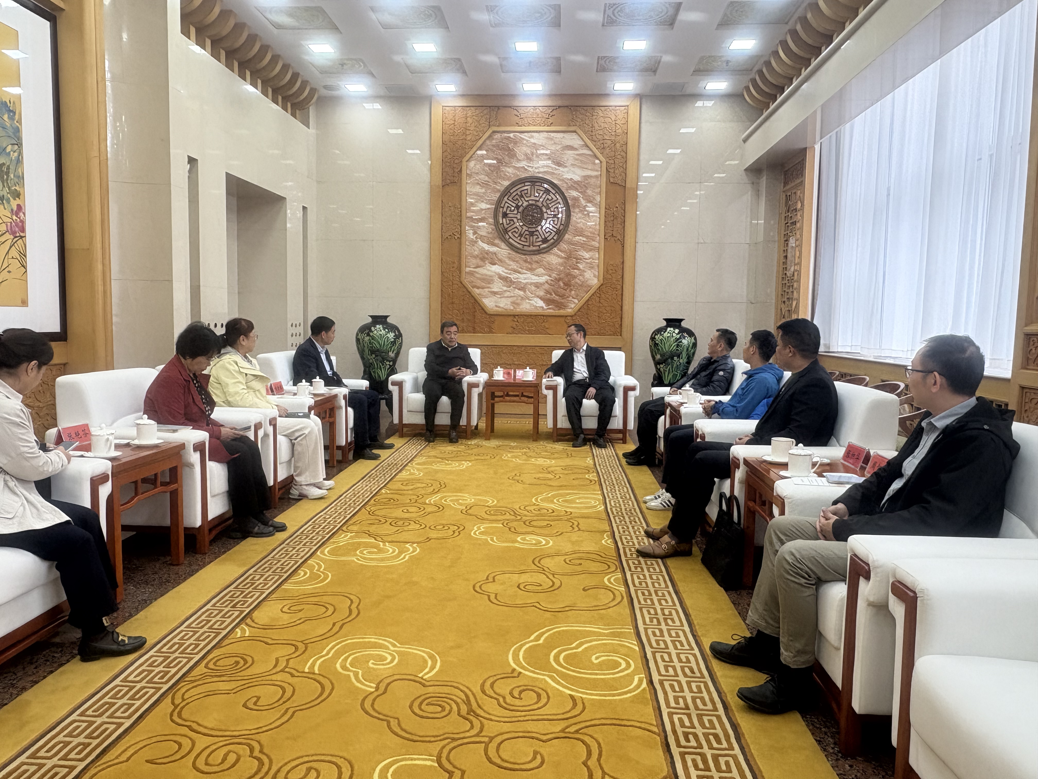 马主委会见调研组.jpg